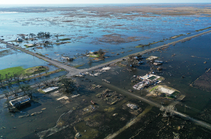an arial view of a flooded coastal town after a hurricane