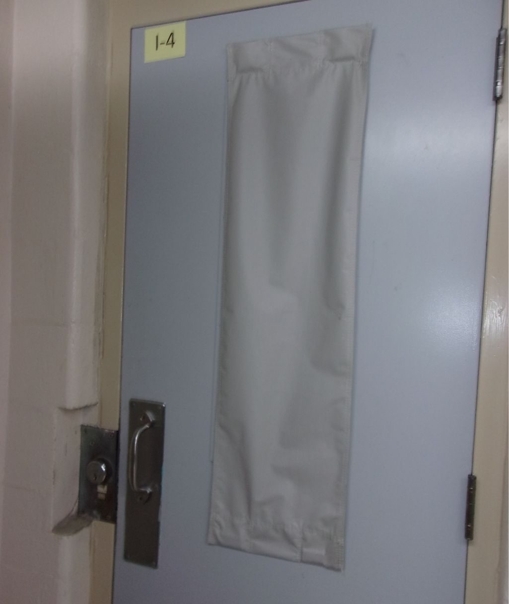 A flap covering a cell door at Cumberland JDC