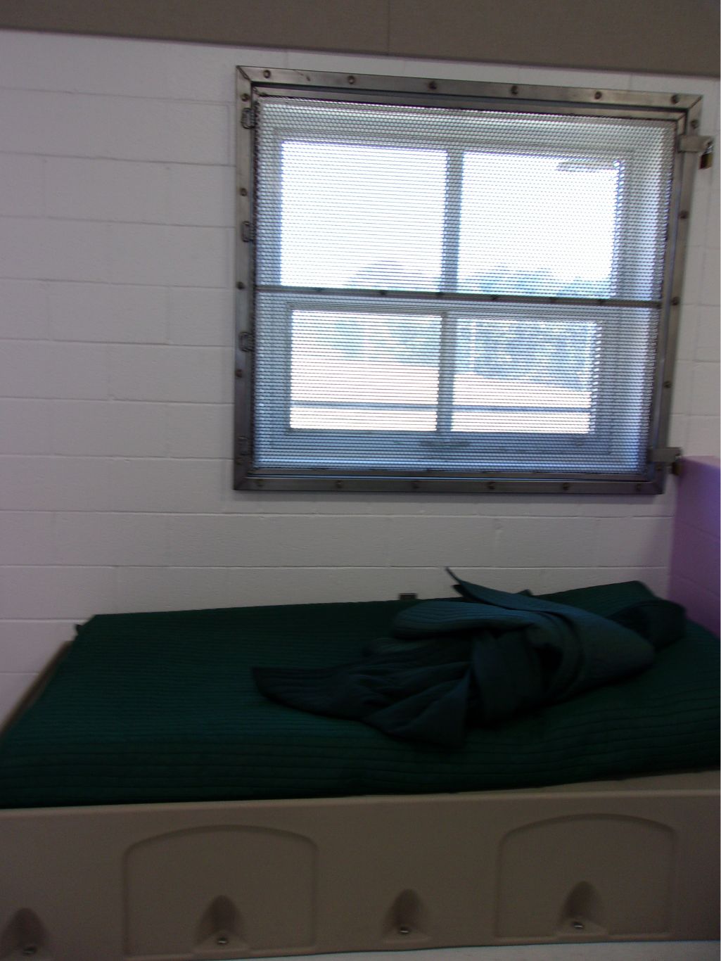 A youth bed and window at Richmond-Jenkins JDC