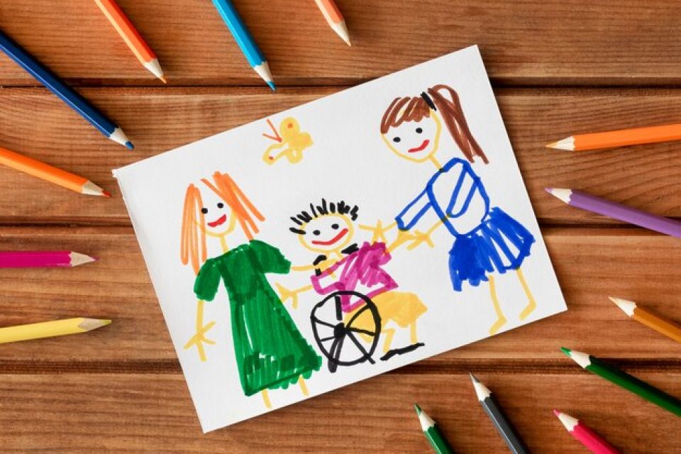 Colored pencil drawing on a table with colored pencils