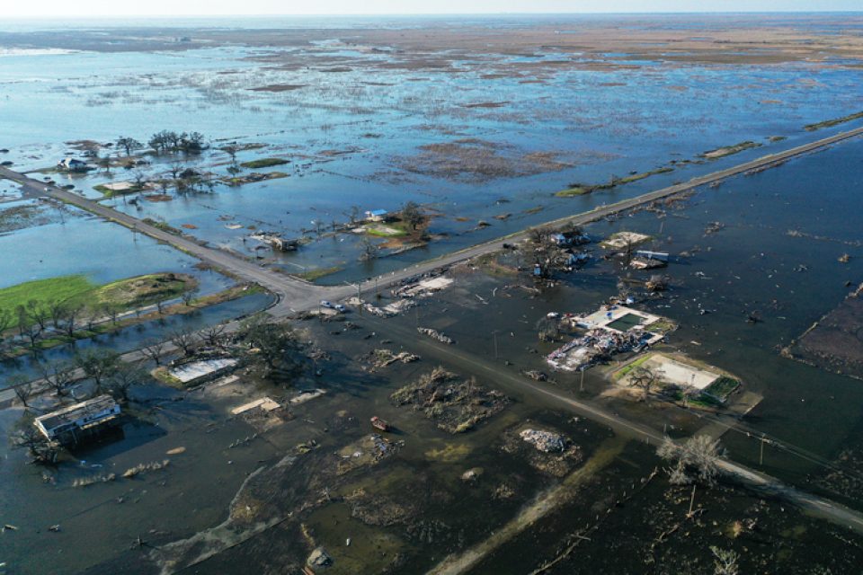 an arial view of a flooded coastal town after a hurricane
