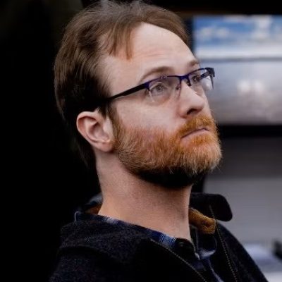 headshot of Lee James