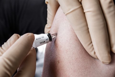 person receiving covid-19 vaccination